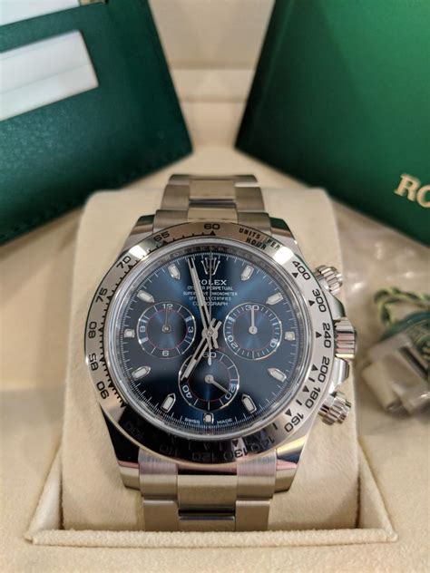 rolex daytona gold blue face|Rolex daytona watch blue face.